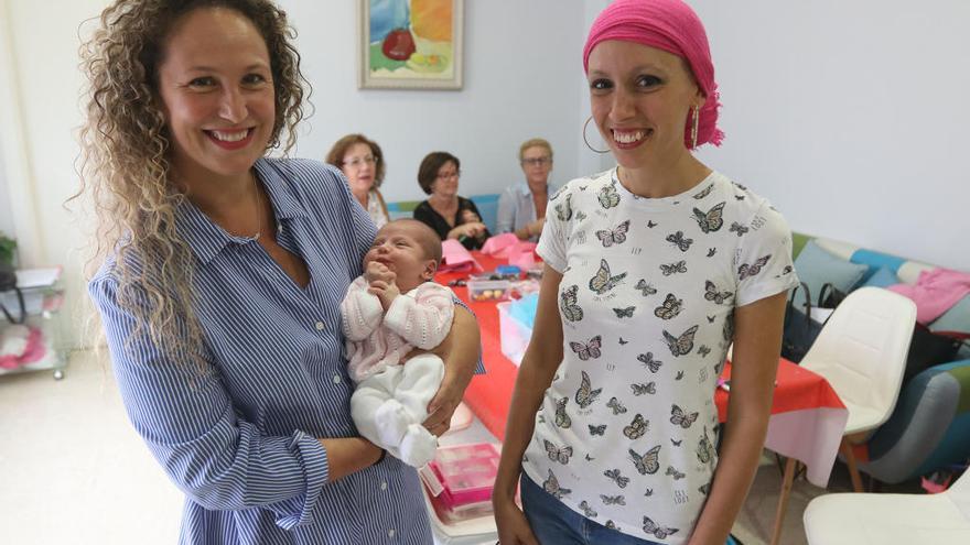 Cristina Díaz y Pili Fernández en la sede de Asamma.