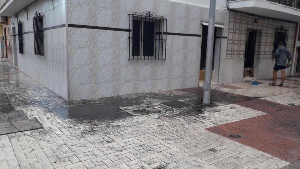 Los efectos de las fuertes lluvias en el barrio de Huelin