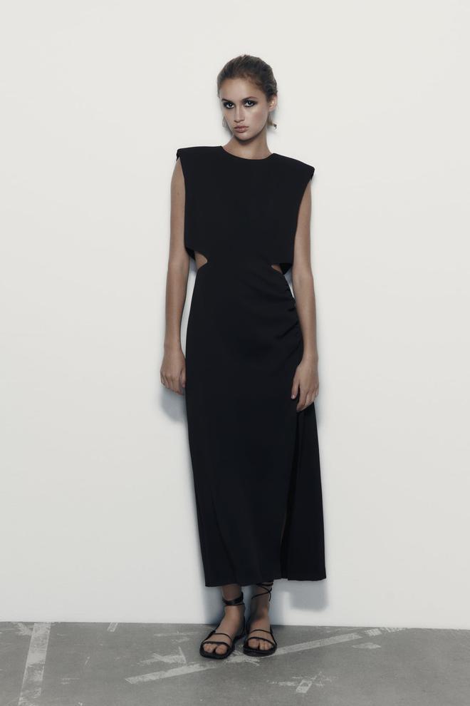 Vestido negro de corte midi y aberturas 'cut out' de Zara
