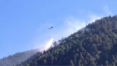 Tasques d'extinció de l'incendi de Lles