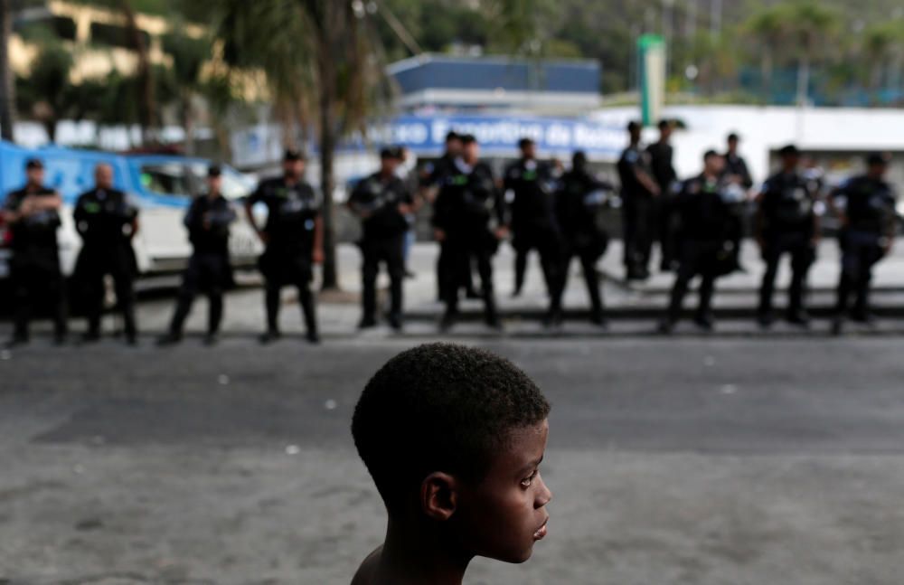 A boy takes part in a protest against police ...