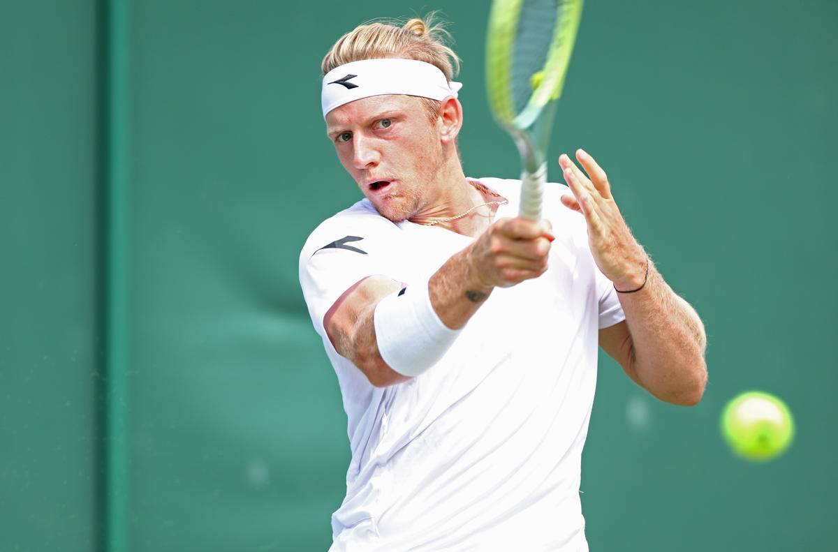 Alejandro Davidovich Fokina  in action against Arthur Fils at the Wimbledon Championships