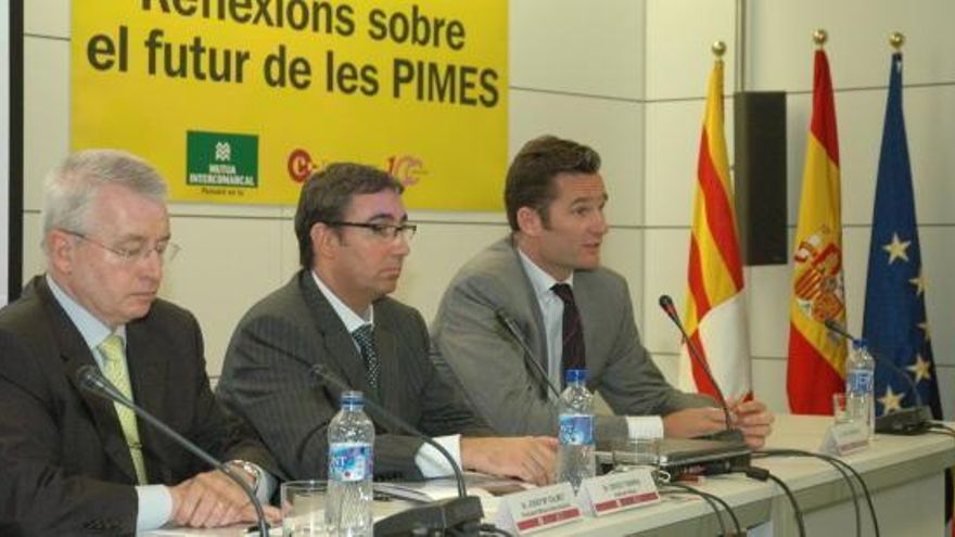 Josep Maria Calmet Iglesias en un acte amb Diego Torres i Iñaki Urdangarin a la Cambra de Comerç de Manresa el 2006