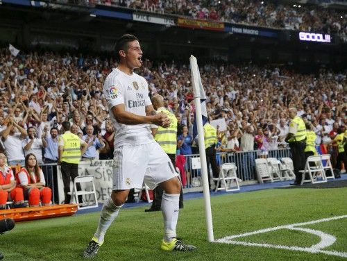 Real Madrid's James celebrates his goal against Real Betis during their Spanish first division soccer match at Santiago Bernabeu stadium in Madrid