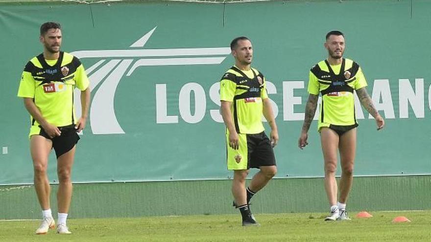 Lolo Plá y Collantes, durante el entrenamiento de ayer en el anexo, junto a Josan.