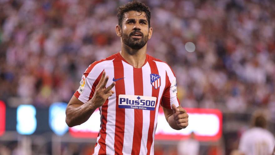 Diego Costa celebra el tercero de sus cuatro goles al Madrid.