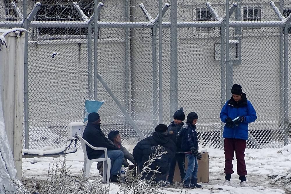 Snow covers the Moria refugees camp on Lesbos ...