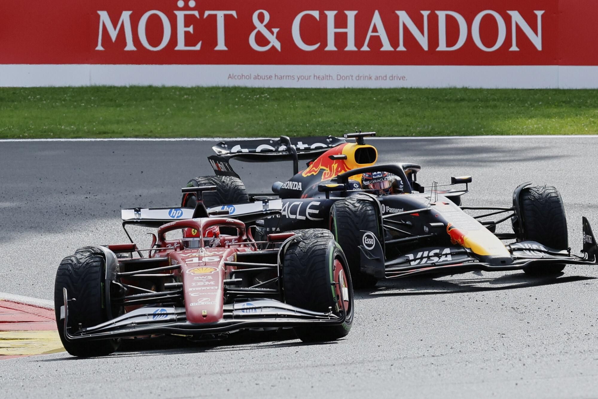 Ferrari driver Charles Leclerc of Monaco, left, steers his car ahead of Red Bull driver Max Verstappen of the Netherlands during the Formula One Grand Prix at the Spa-Francorchamps racetrack in Spa, Belgium, Sunday, July 27, 2025. (AP Photo/Geert Vanden Wijngaert) Associated Press / LaPresse Only italy and spain. EDITORIAL USE ONLY/ONLY ITALY AND SPAIN