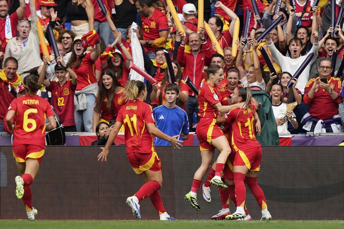 Spain's Mariona Caldentey celebrates with teammates after scoring her sides first goal during the Women's Euro 2025 final soccer match between England and Spain at St. Jakob-Park in Basel, Switzerland, Sunday, July 27, 2025. (AP Photo/Martin Meissner)