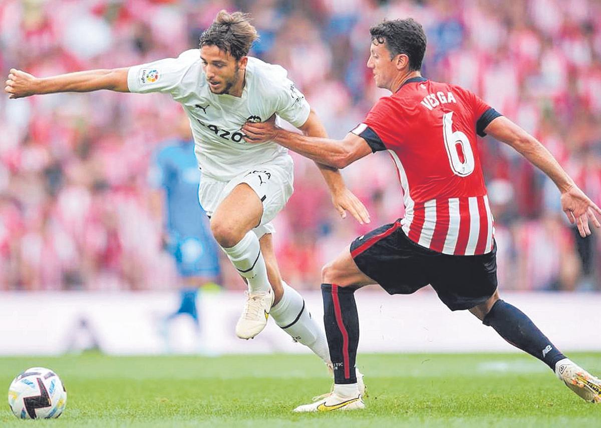 Nico González, con Vesga