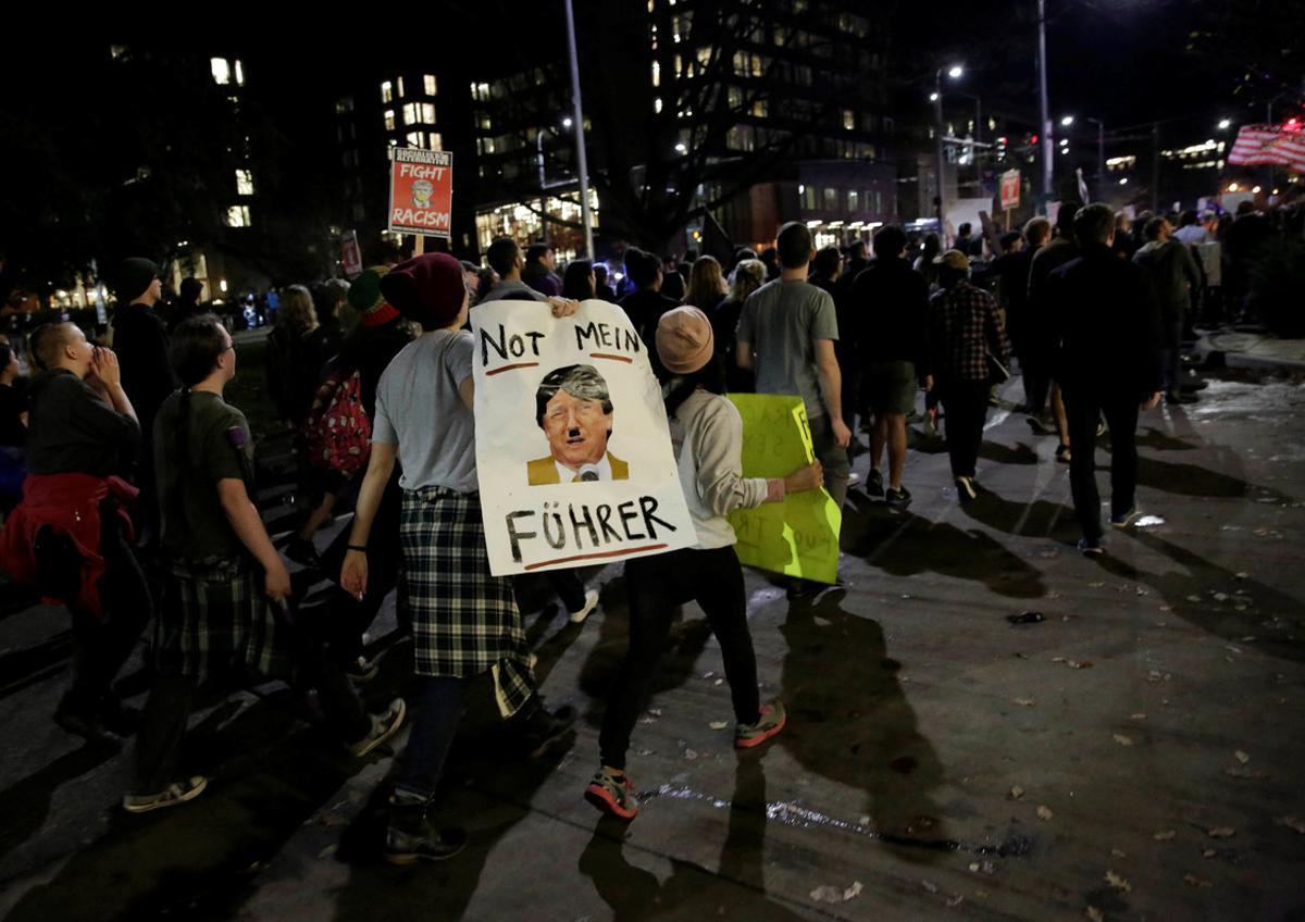 People march in protest to the election of Republican Donald Trump as the president of the United States in Seattle, Washington, U.S. November 9, 2016.  REUTERS/Jason Redmond