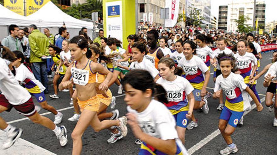 Varios momentos de la segunda carrera infantil, en sus distintas categorías. i ANDRÉS CRUZ