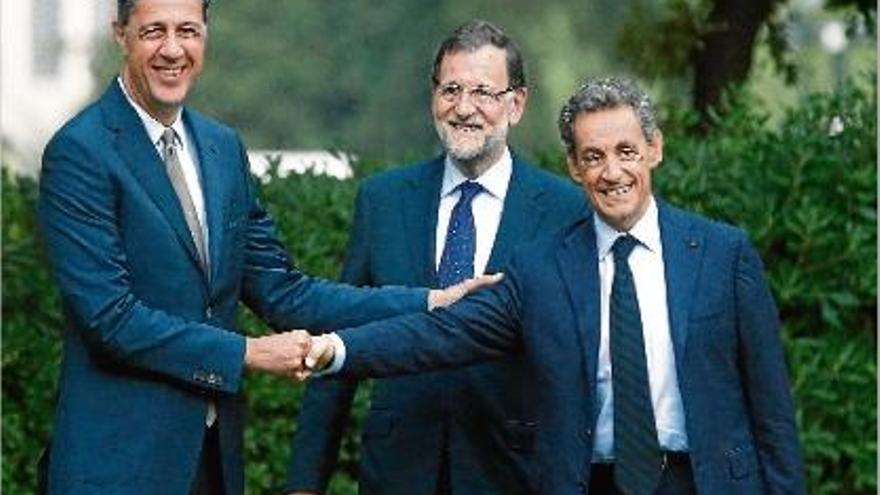 Xavier García Albiol, Mariano Rajoy i Nicolas Sarkozy, ahir, a Barcelona.