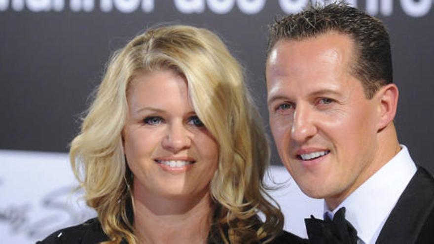 Michael y Corinna Schumacher, en un acto juntos en 2010.