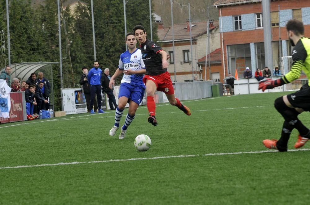 El partido entre el Tuilla y el Langreo, en imágenes