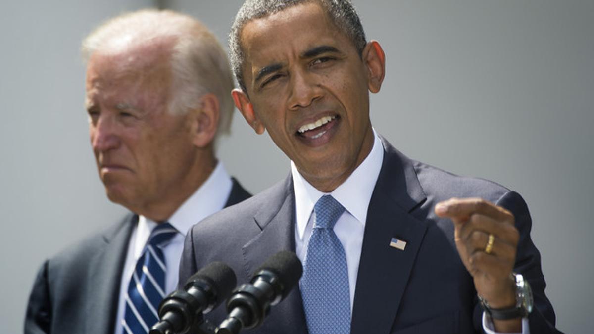 Barack Obama, junto al vicepresidente Joe Biden, durante su comparecencia en la Casa Blanca, este sábado.