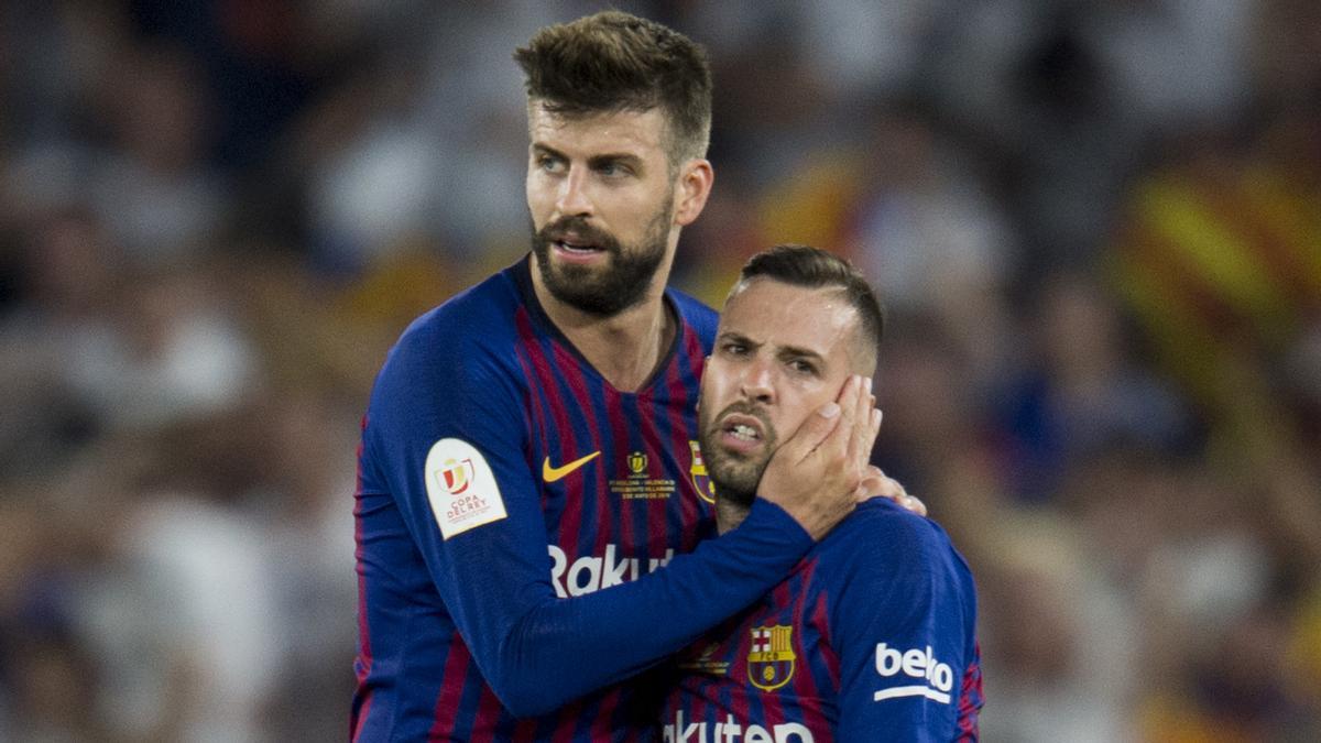 Gerard Piqué y Jordi Alba, durante un encuentro del Barcelona.