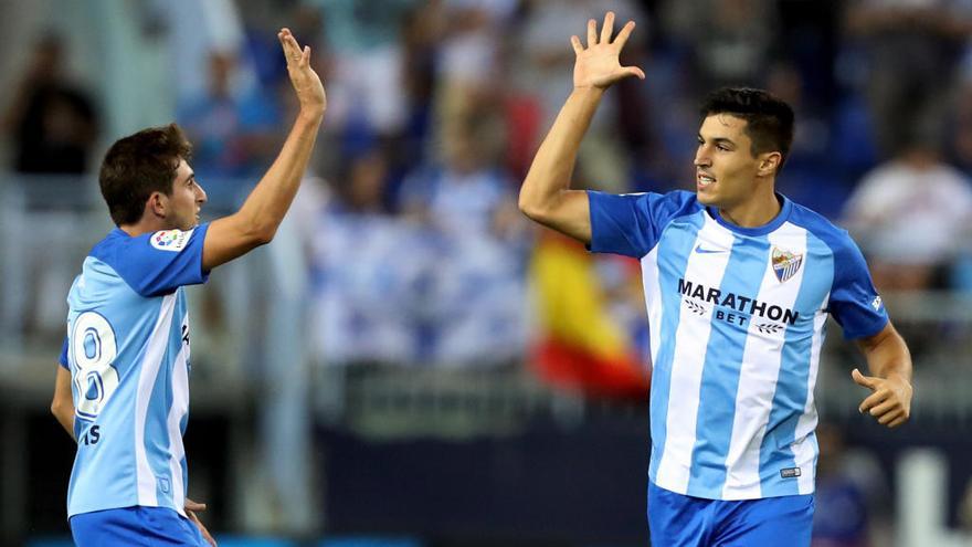 González celebra su gol junto a Mula