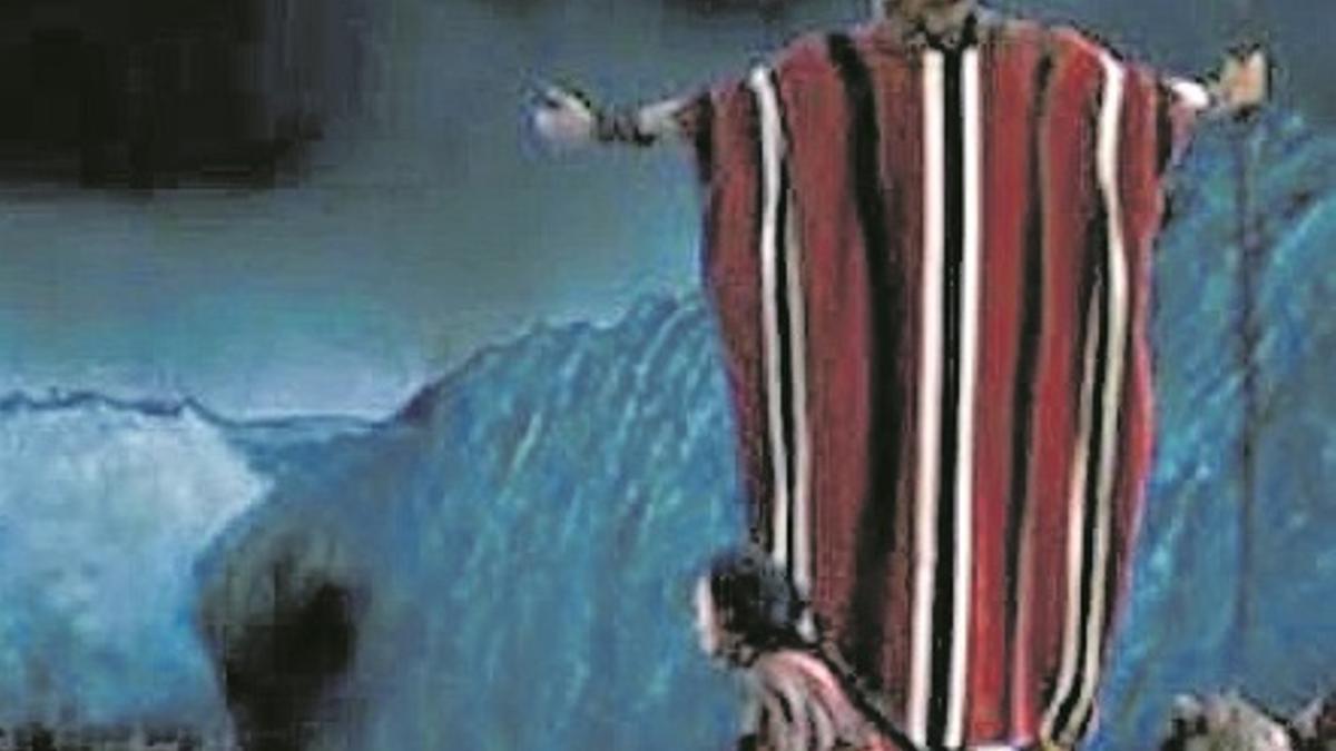 Charlton Heston como Moisés.