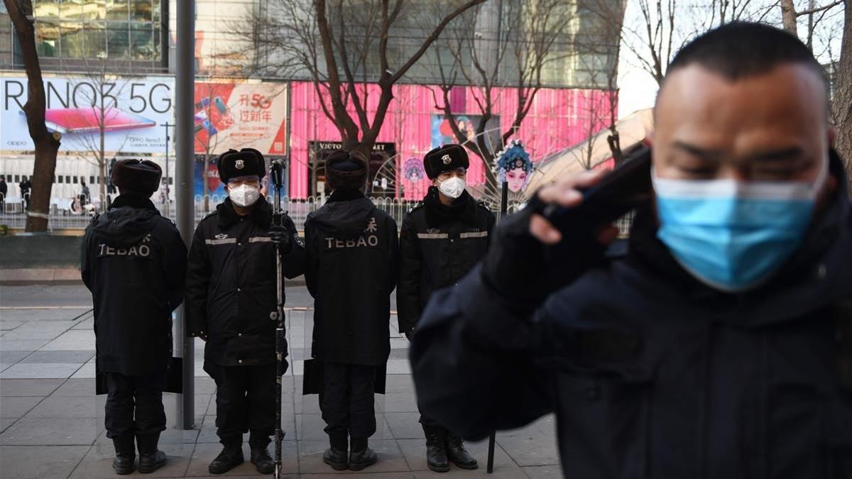 zentauroepp52334914 security guards wearing protective face masks  amid concerns200217222351