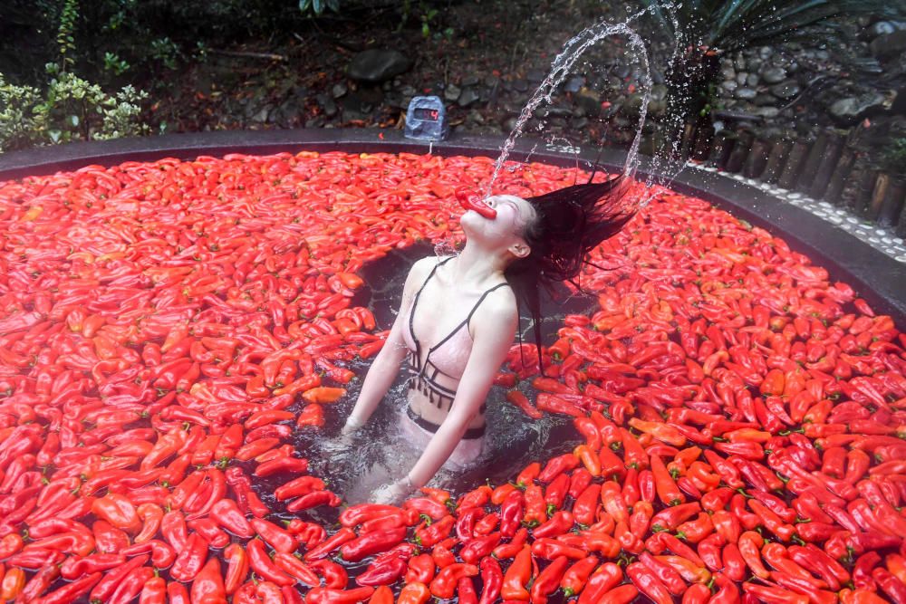 Participant takes part in a chilli-eating ...