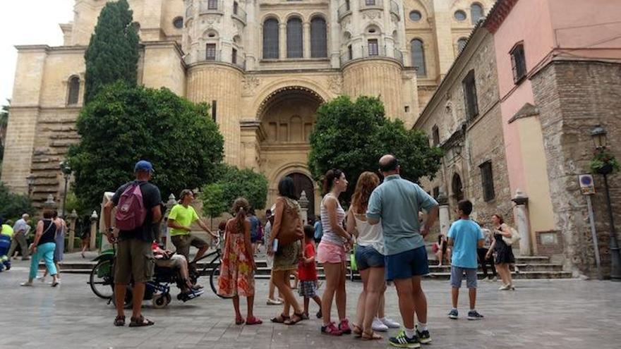 Turistas en el Centro de la capital malagueña.