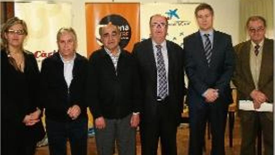 A. Gil (Aldees), R. Barnera (Càritas), J. M. Noguer (Girona Centre), J. Sullastres (La Caixa), Jordi Mias (Girona i Radial) i Frederic Gómez (Banc dels Aliments).