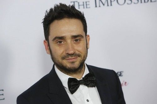 Director Juan Antonio Bayona arrives at the premiere of the movie "The Impossible" at Arclight Cinema in Hollywood