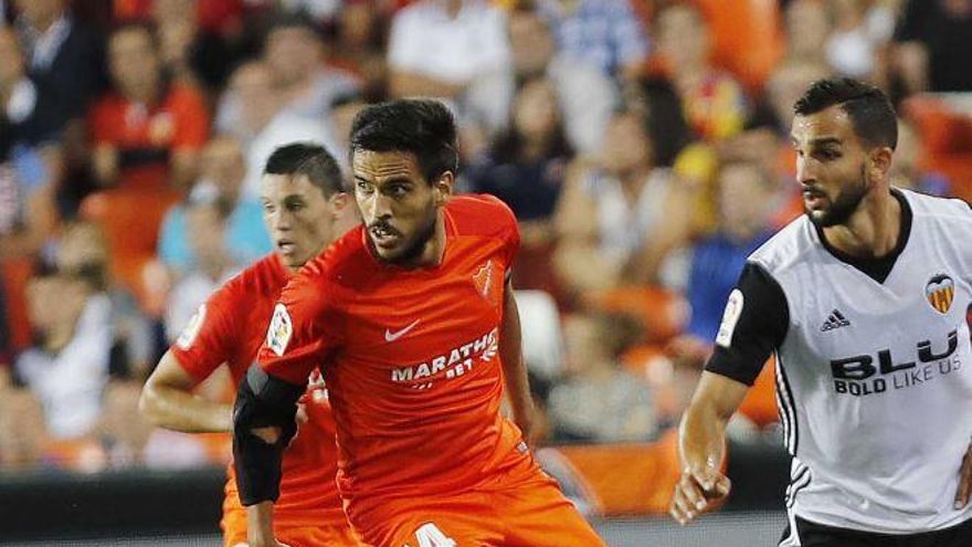 Recio, junto a Montoya en Mestalla.