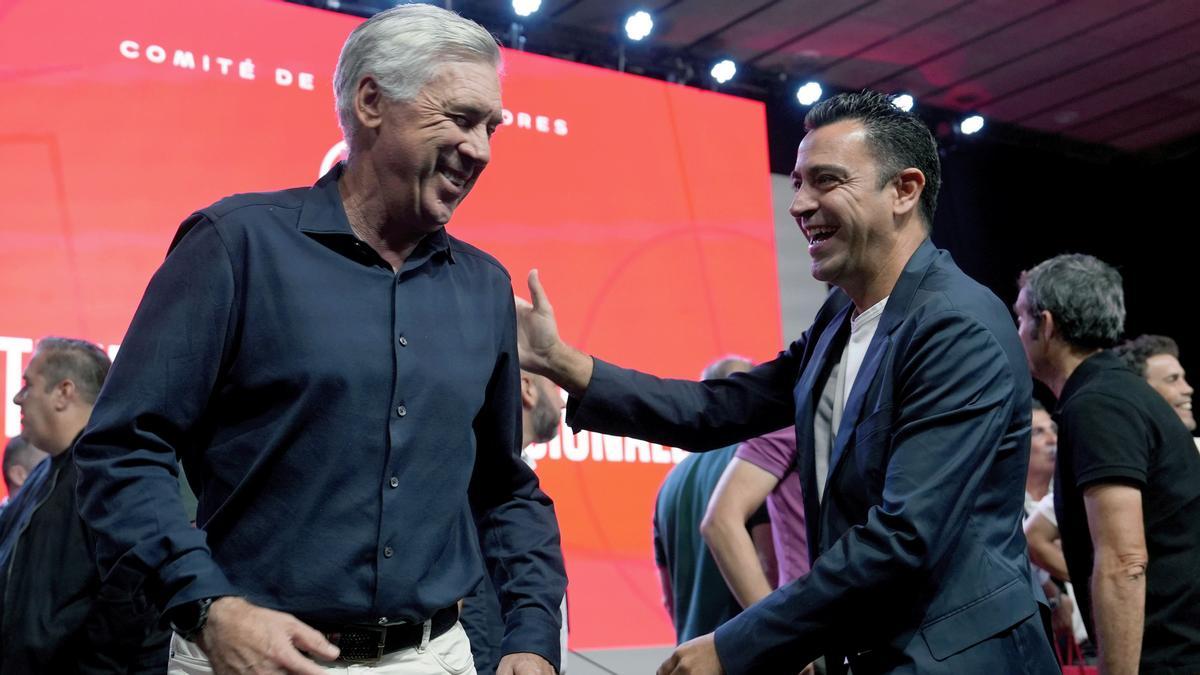 Ancelotti y Xavi en la Reunión de entrenadores de la Federación