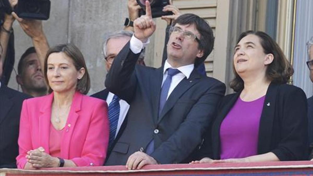 Ada Colau y Carles Puigdemont.