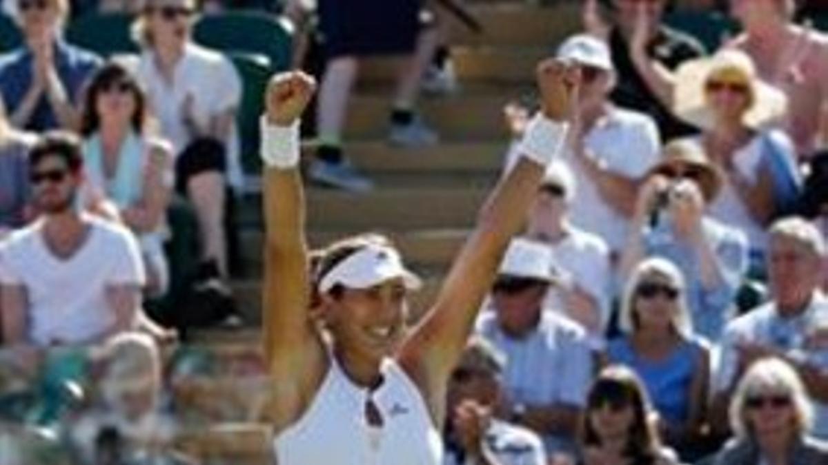 Muguruza celebra con euforia su pase a los cuartos de final.