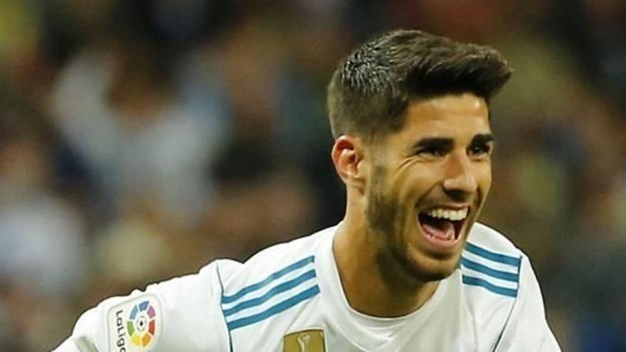 Marco Asensio celebra el gol de Ronaldo, en jugada iniciada por él.