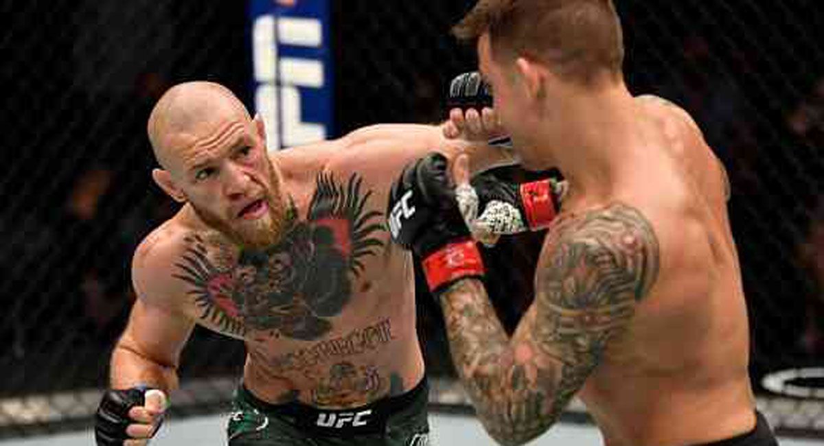 McGregor y Poirier, durante su última pelea.