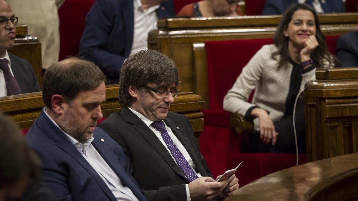 Oriol Junqueras, Carles Puigdemont e Inés Arrimadas, en una imagen de archivo.