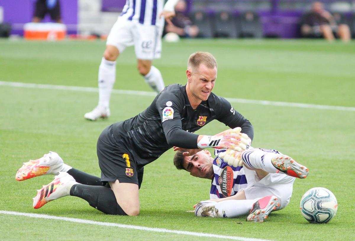 Kike Perez of Real Valladolid and Marc-Andre Ter Stegen of FC Barcelona fight for the ball during the spanish league, La Liga, football match played between Real Valladolid and FC Barcelona at Jose Zorrilla Stadium on July 11, 2020 in Valladolid, Spain.