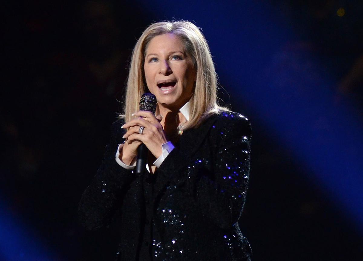 FILE - In this Oct. 11, 2012, file photo, singer Barbra Streisand performs at the Barclays Center in the Brooklyn borough of New York. Streisand will take the stage at the Tony Awards on June 12, 2016. The singer and actress, who was a Tony nominee in 1962 for I Can Get It for You Wholesale and in 1964 for Funny Girl, hasn’t graced Tony night since 1970, when she got a special Tony. (Photo by Evan Agostini/Invision/AP, File)