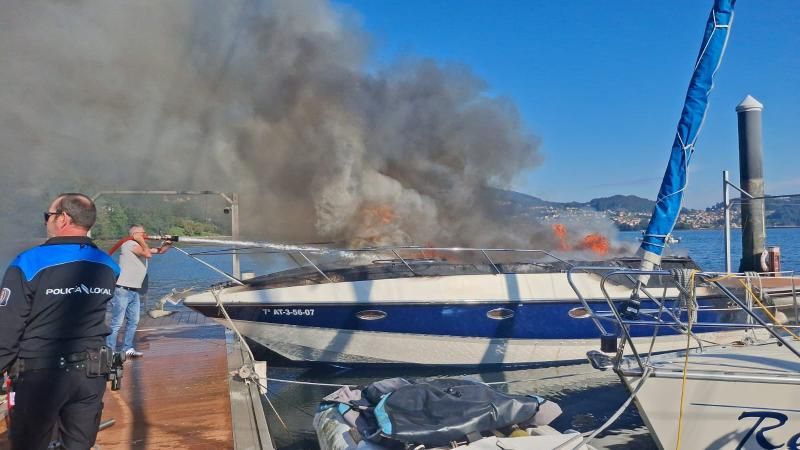 Una columna de humo se levanta en la ría de Vigo: arde una embarcación en San Adrián de Cobres