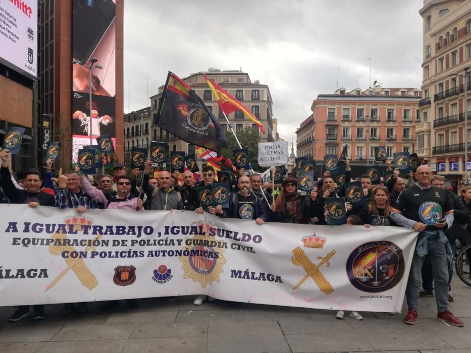 Malagueños en la manifestación de Jusapol en Madrid.
