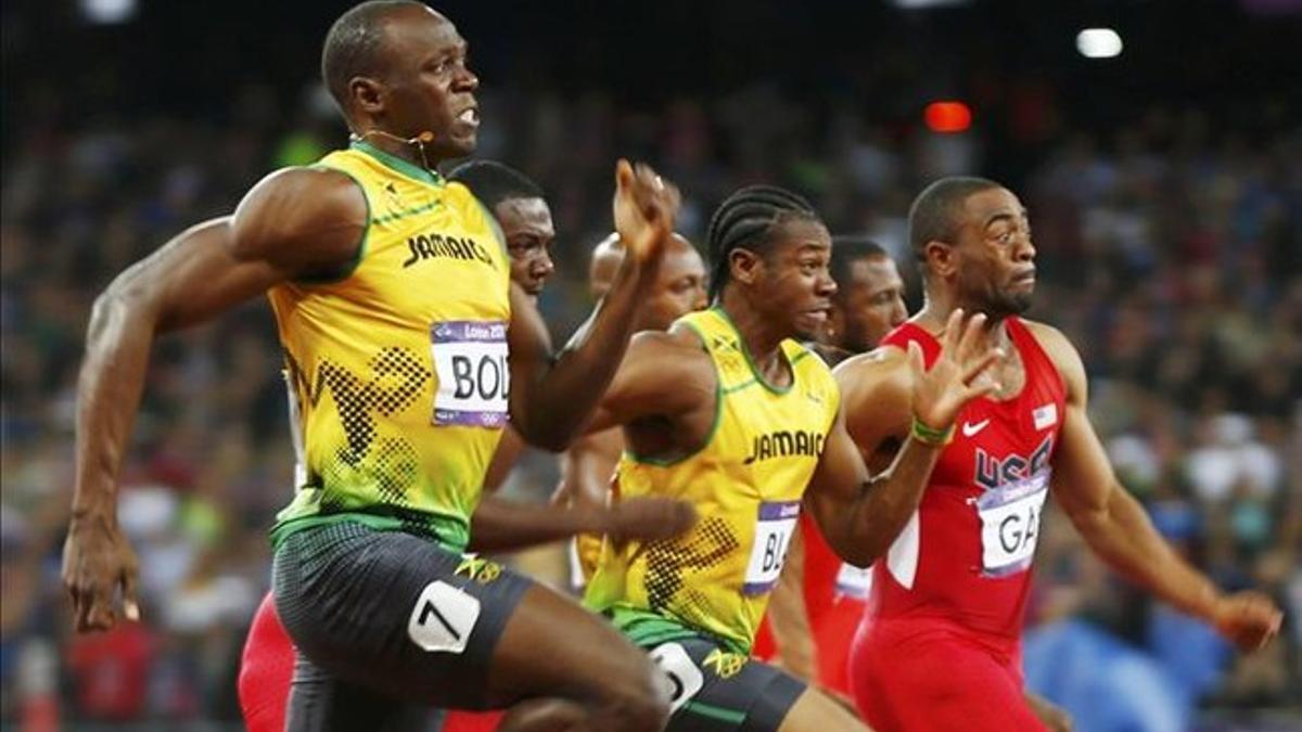 Usain Bolt  y Tyson Gay, en la final olímpica