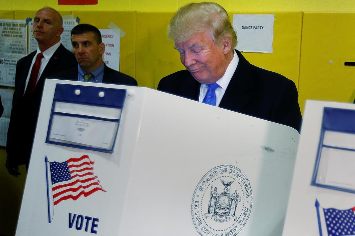 Republican presidential nominee Donald Trump votes at PS 59 in New York, New York, U.S. November 8,  2016.   REUTERS/Carlo Allegri