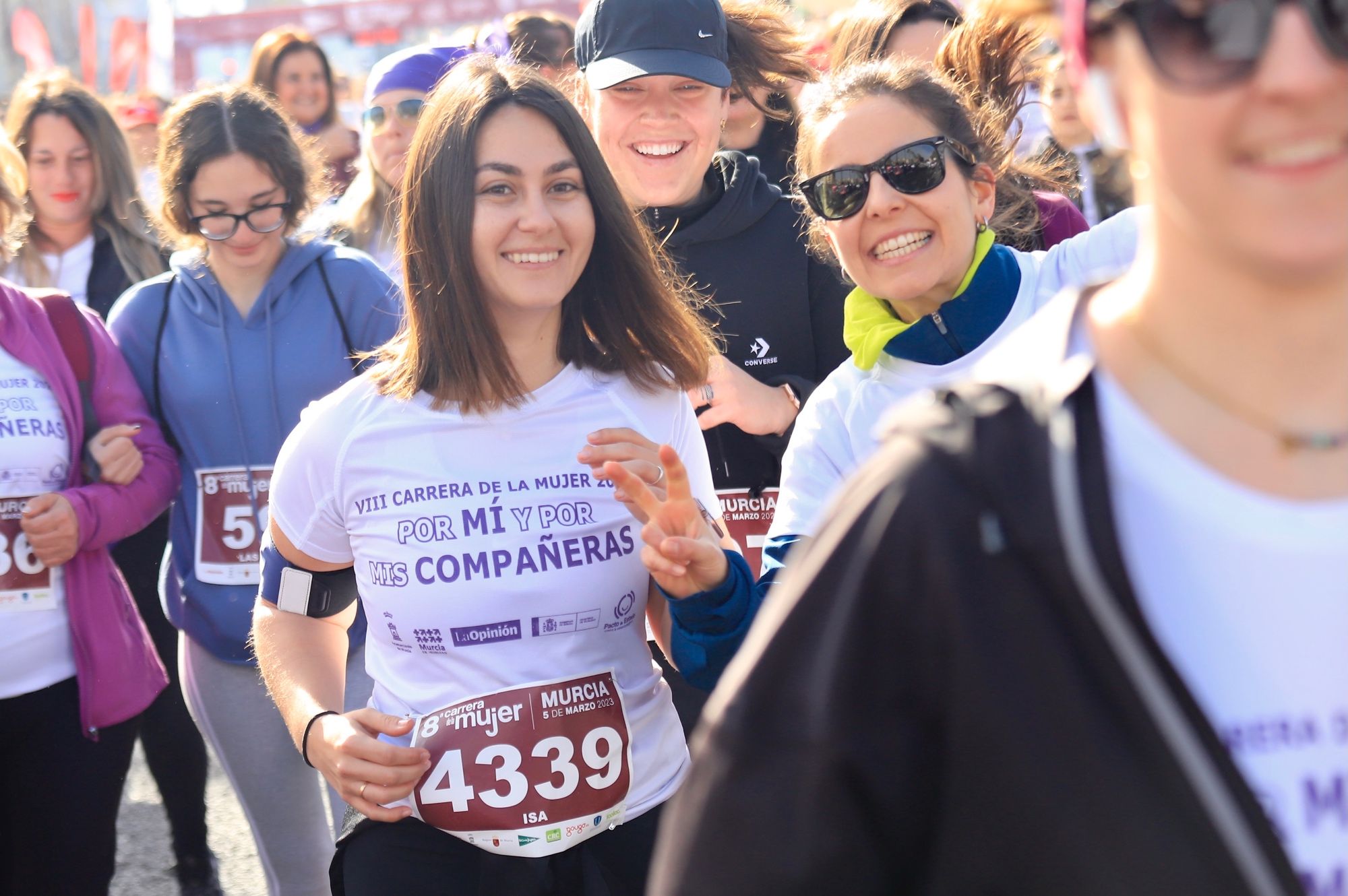 La salida y el recorrido de la Carrera de la Mujer 'inmortalizados' en imágenes