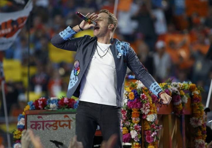 Chris Martin, lead singer of Coldplay, performs during the half-time show at the NFL's Super Bowl 50 between the Carolina Panthers and the Denver Broncos in Santa Clara