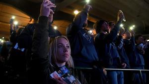 ANAHEIM, CA - FEBRUARY 10: Members of the community hold lights at the end of the memorial service honoring baseball coach John Altobelli, his wife, Keri, and their daughter Alyssa at Angel Stadium of Anaheim on February 10, 2020 in Anaheim, California. The Altobellis were traveling with former Lakers star Kobe Bryant, his 13-year-old daughter Gianna and four others when the helicopter crashed Jan. 26 in foggy conditions, killing everyone on board.   Jayne Kamin-Oncea/Getty Images/AFP