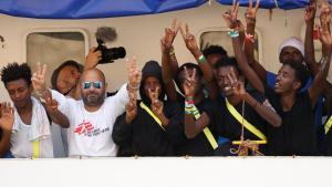 zentauroepp44669099 crew members and migrants cheer onboard the humanitarian shi180815143307