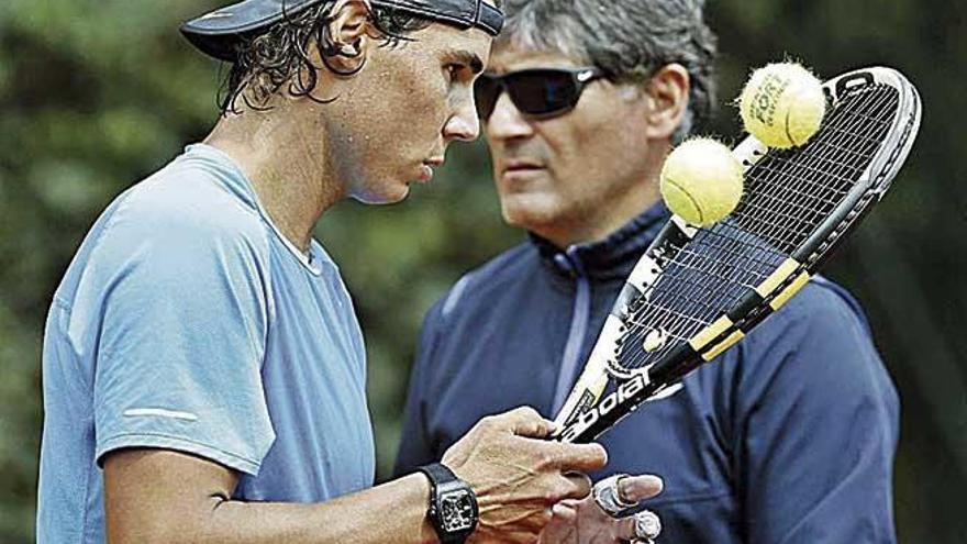 Rafel y Toni Nadal, durante un entrenamiento.