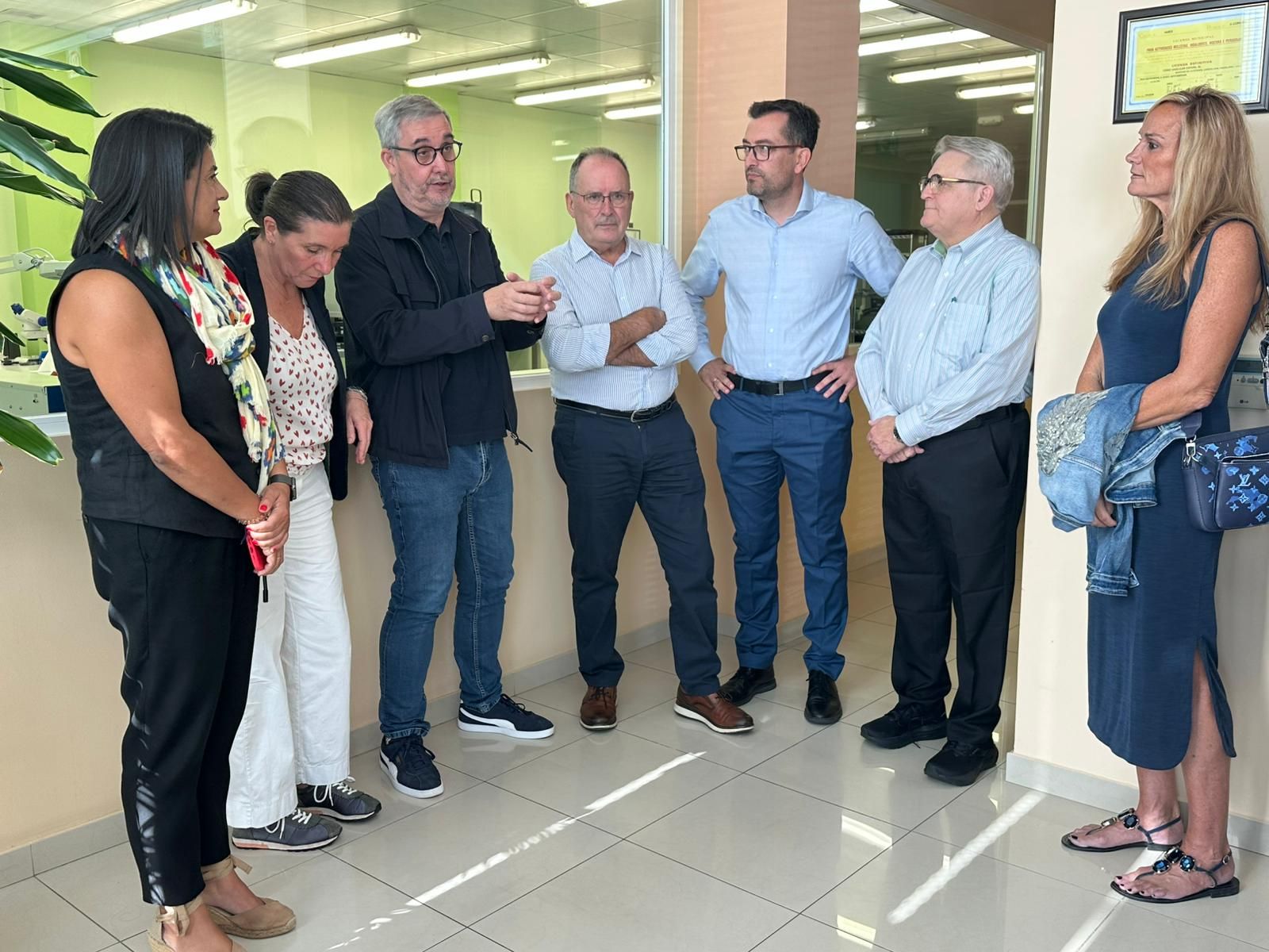 García, Paz e Señorís, esq., na súa visita a TAGG Worldwide.