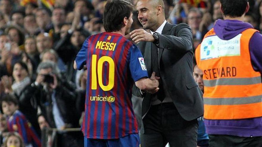 Leo Messi amb Pep Guardiola en una foto d&#039;arxiu