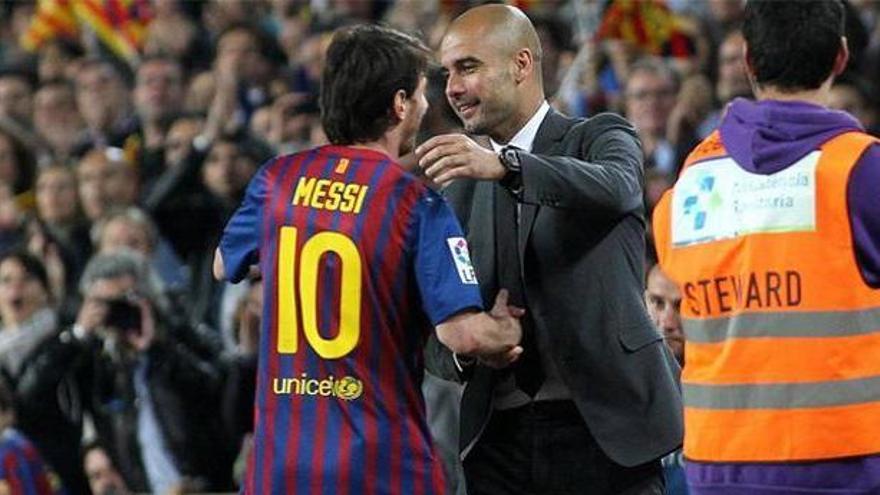 Leo Messi amb Pep Guardiola en una foto d&#039;arxiu