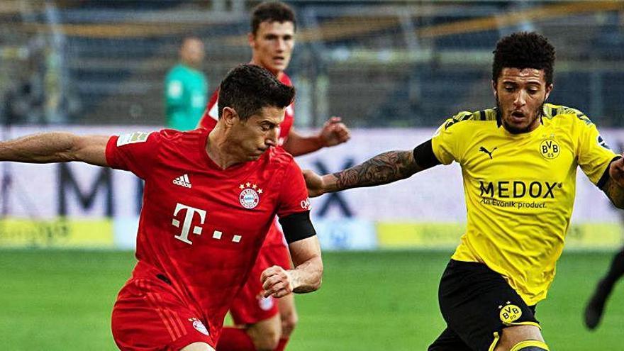 Lewandowski y Jadon Sancho el pasado martes.